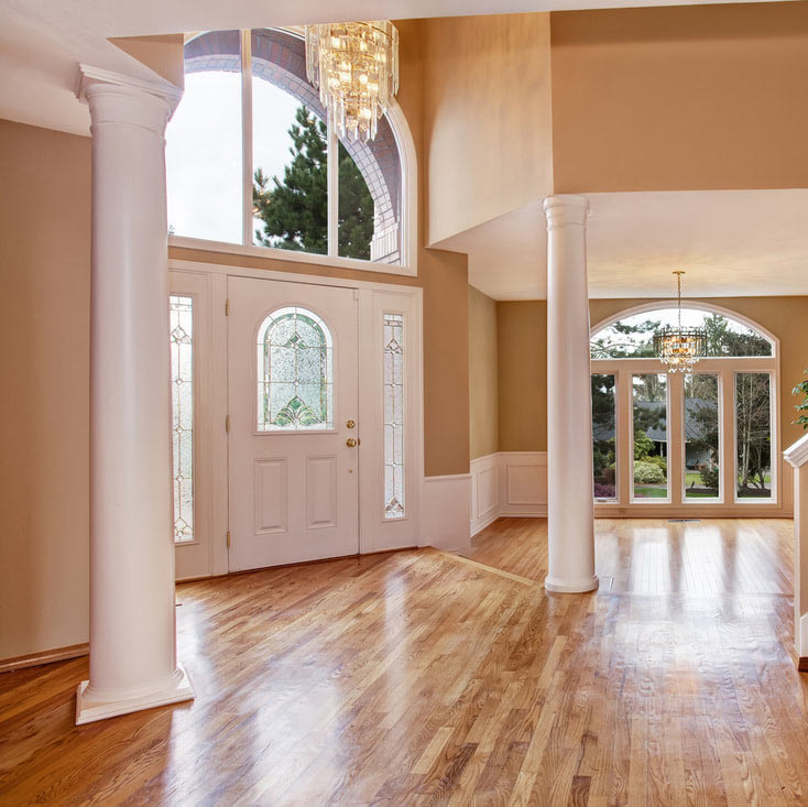 Large foyer with hardwood flooring