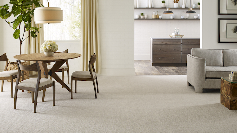 durable textured carpets in a dining and living room